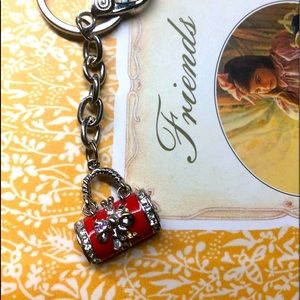 A cute little handbag with bling for your keys or zipper